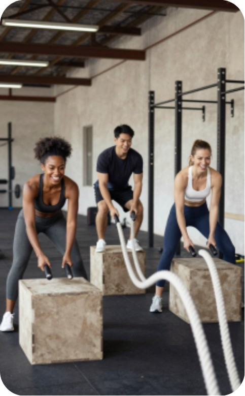 Friends training together at the gym